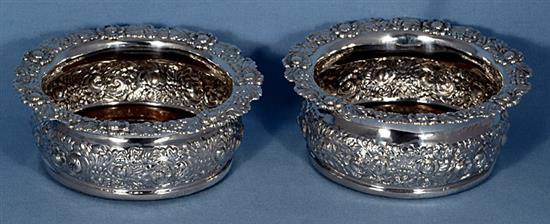 A large pair of George IV silver wine coasters, by John & Thomas Settle, diameter 174mm. Gross weight 23.5oz/736 grams